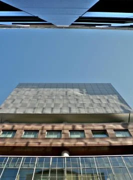 Two buildings merging Stock Photos
