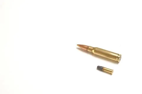 Two bullets, one small and one large Stock Photos