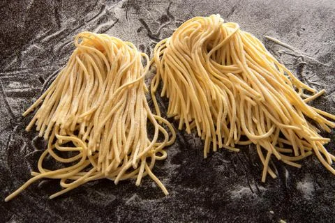 Two bundles of spaghetti Stock Photos