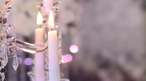 Two burning candles and blurred background Stock Footage 62378952