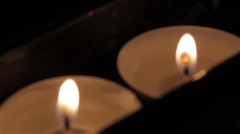 Two burning candles light is Stock Footage 43861722