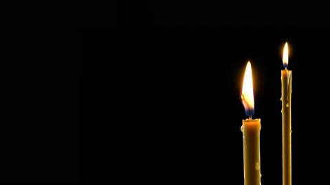 Two burning candles as a mocap or template with place for text. Black dramati Stock Footage 138097917