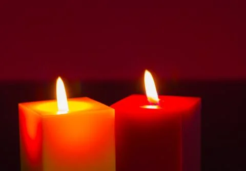Two burning candles Stock Photos