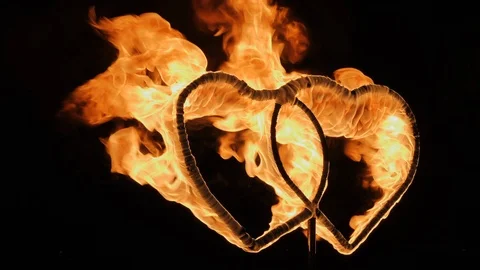 Two burning hearts on wedding fireshow Stock Footage 86818422