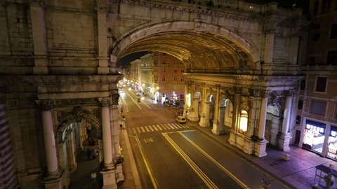 Two buses cross each other under a monumental bridge Stock Footage 103492797