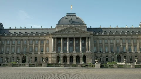 Two buses drive past Royal Palace Stock Footage 111320883