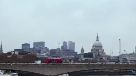 Two buses pass St. Paul's Cathedral Stock Footage 120583380