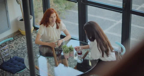 Two business colleagues talking during a coffee break at work. Slow motion. Stock Footage 146200734