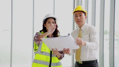 Two business construction site engineer. Engineering objects on workplace wit Stock-Footage 162376134