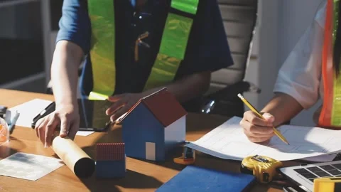 Two business man construction site engineer. Engineering objects on workpla.. Stock Footage 306572686