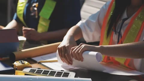 Two business man construction site engineer. Engineering objects on workpla.. Stock Footage 306572692