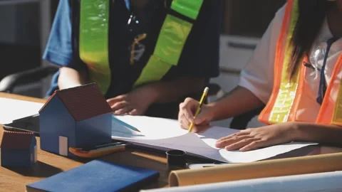Two business man construction site engineer. Engineering objects on workpla.. Stock Footage 306572717