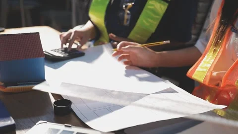 Two business man construction site engineer. Engineering objects on workpla.. Stock Footage 306572724