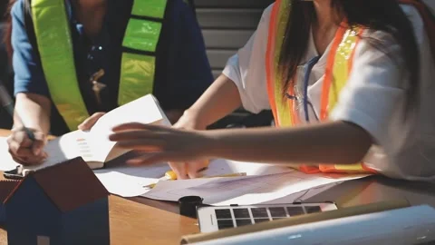 Two business man construction site engineer. Engineering objects on workpla.. Stock Footage 306572746