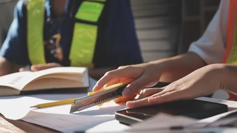 Two business man construction site engineer. Engineering objects on workpla.. Stock Footage 306572756