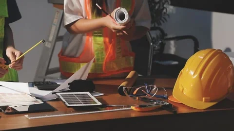 Two business man construction site engineer. Engineering objects on workpla.. Stock Footage 306573678