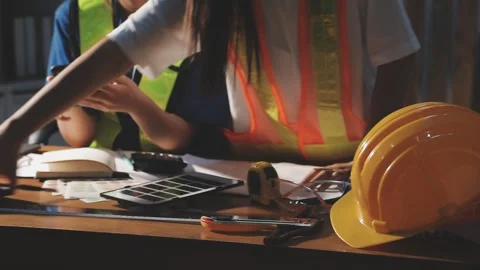 Two business man construction site engineer. Engineering objects on workpla.. Stock Footage 306573733