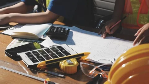 Two business man construction site engineer. Engineering objects on workpla.. Stock Footage 306573773