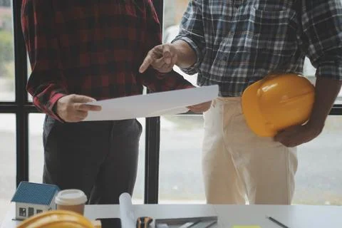 Two business man construction site engineer. Engineering objects on workpla.. Stock Photos
