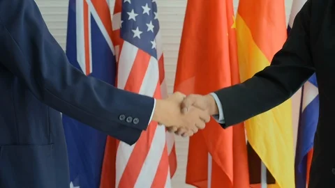 Two business mans or politicians shake hand with one use two hands Stock Footage 127222860