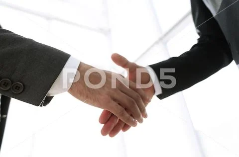 Two business men going to make handshake Stock Photos