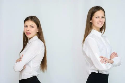 Two business models standing with their backs together Stock Photos