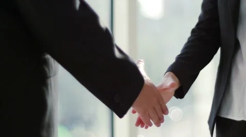 Two business partner shake hands when meeting. In slow motion Stock-Footage 53848211