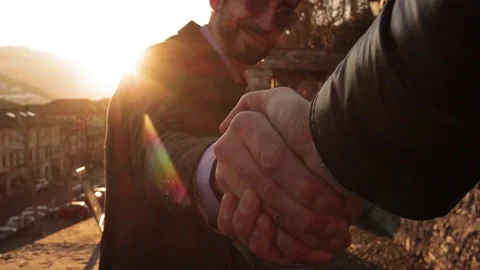 Two business partner shake hands Stock Footage 103455487
