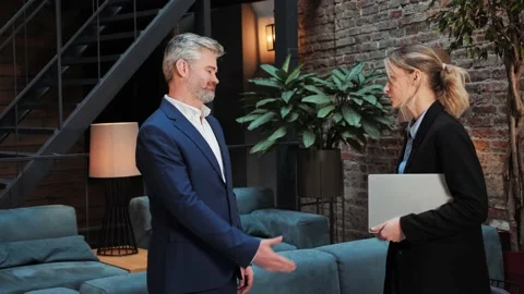 Two business partners do handshake in conference hall. A good business deal. Video stock 232475714