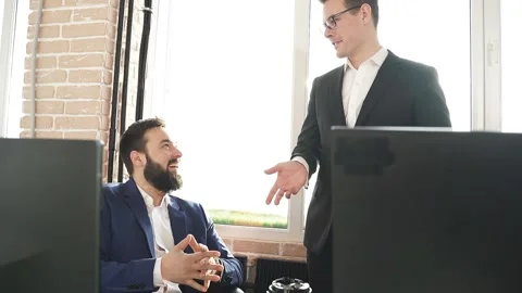 Two business partners talking in office. Stock Footage 152777448