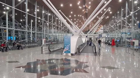 Two business person walking from an elevator at Colombo airport Stock Footage 239780695
