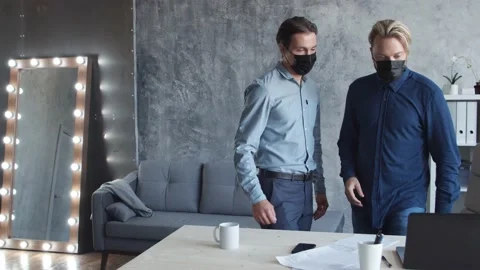 Two business persons are work together in modern office. Team of businessmen are Stock Footage 142925480