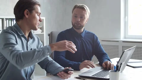 Two business persons are work together in modern office. Team of businessmen are Stock Footage 143031492