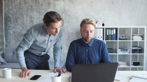 Two business persons are work together in modern office. Team of businessmen are Video stock 143342553