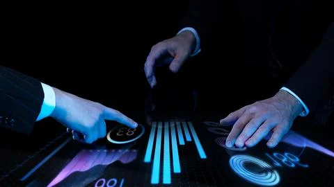 Two business professionals analyzing digital financial data on interactive touch 스톡 사진