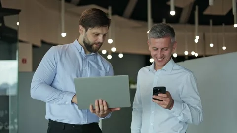 Two Business Professionals Discuss Work In Modern Office Stock-Footage 282241293
