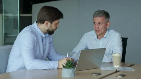 Two Business Professionals Having a Discussion in the Office Video stock 281626531