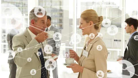 Two business professionals holding cups, woman gesturing and growing node Stock Footage 333904580
