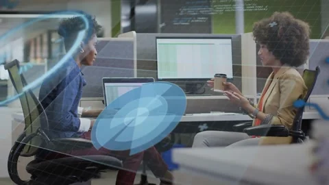 Two business staff tapping laptop reviewing spreadsheet to decide, blue circles Stock Footage 332468818