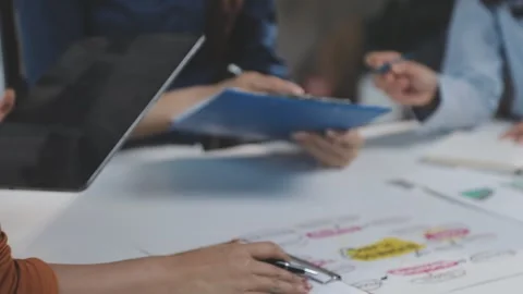 Two Businessman Calculating Bills Using Calculator At Workplace. Business t.. Stock Footage 328996093