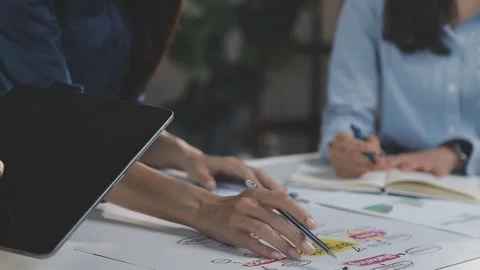 Two Businessman Calculating Bills Using Calculator At Workplace. Business t.. Stock Footage 328996297