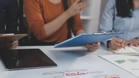 Two Businessman Calculating Bills Using Calculator At Workplace. Business t.. Stock Footage 328996432