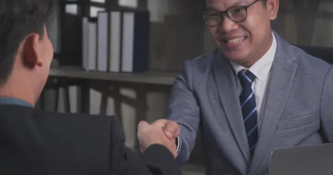 Two Businessman signing contract document start business agreement dealing teamw Video stock 154304104