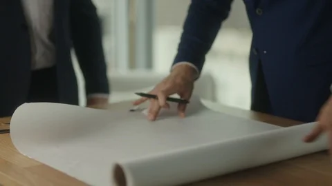 Two businessmen create blueprint in office with view on downtown LA Vídeos de archivo 127412563