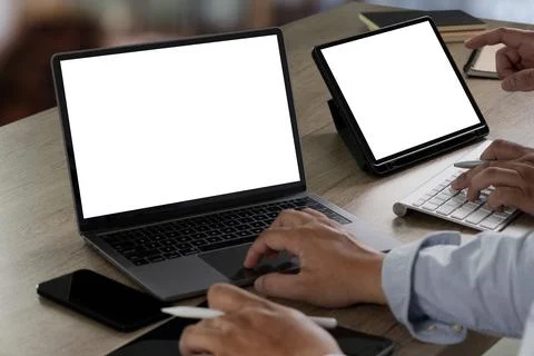 Two businessmen digital computer tablet touch screen device isolated screen.. Stock Photos