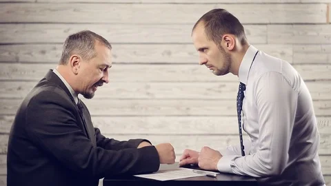 Two businessmen discuss the contract Stock Footage 99552901