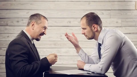 Two businessmen discuss the contract Stock Footage 99553145