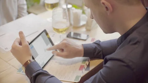 Two businessmen discussing project on the tablet Stock Footage 72618377