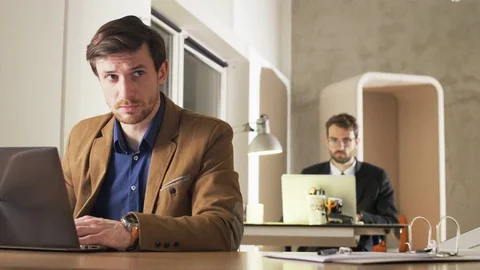 Two Businessmen Focused on Work Stock Footage 70918313