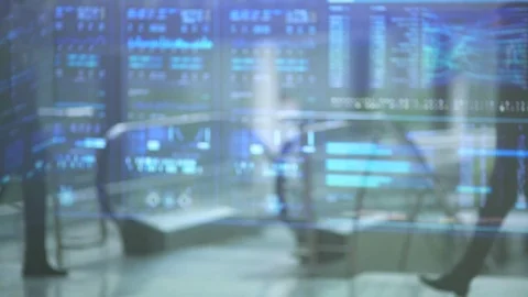 The two businessmen handshake over the virtual display Stock Footage 76547190